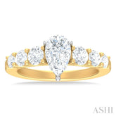 1 1/10 ctw Pear Shape Round Cut Diamond Semi Mount Engagement Ring in 14K Yellow and White Gold